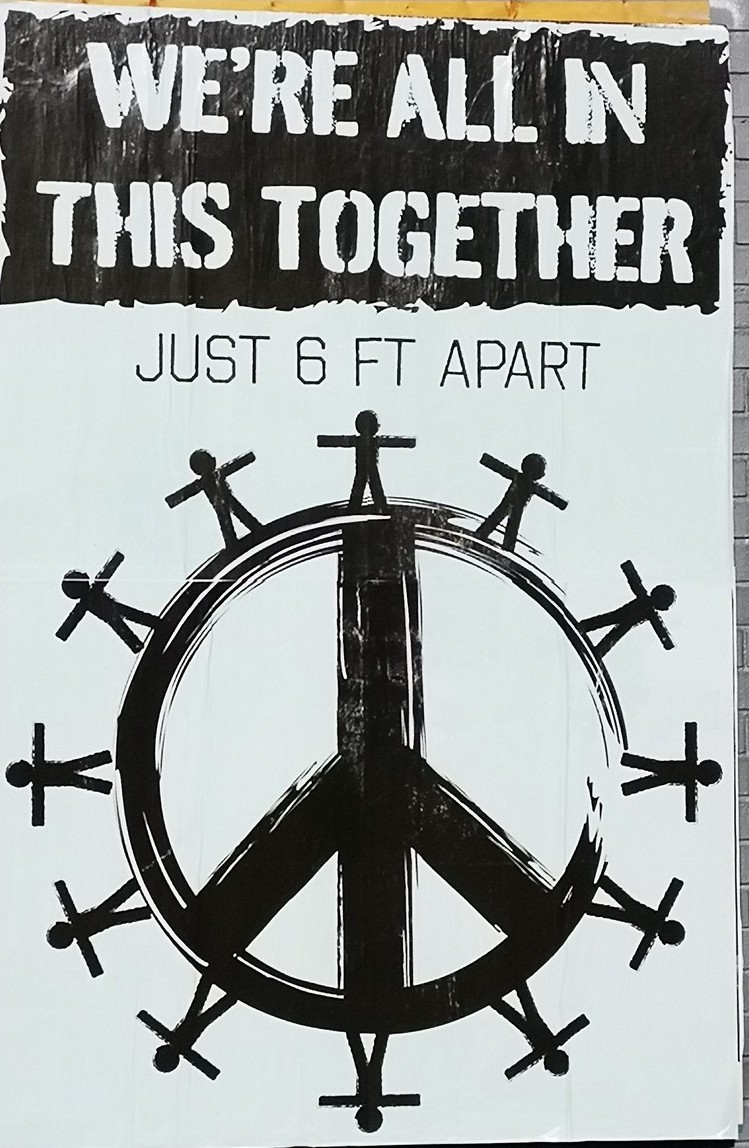 Peace sign styled as a globe with stick people encircling it; caption, "we're in this together, just 6 feet apart"