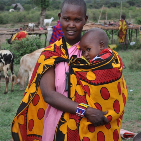 Maasai Mother holds child