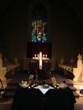 Cross, candles and altar